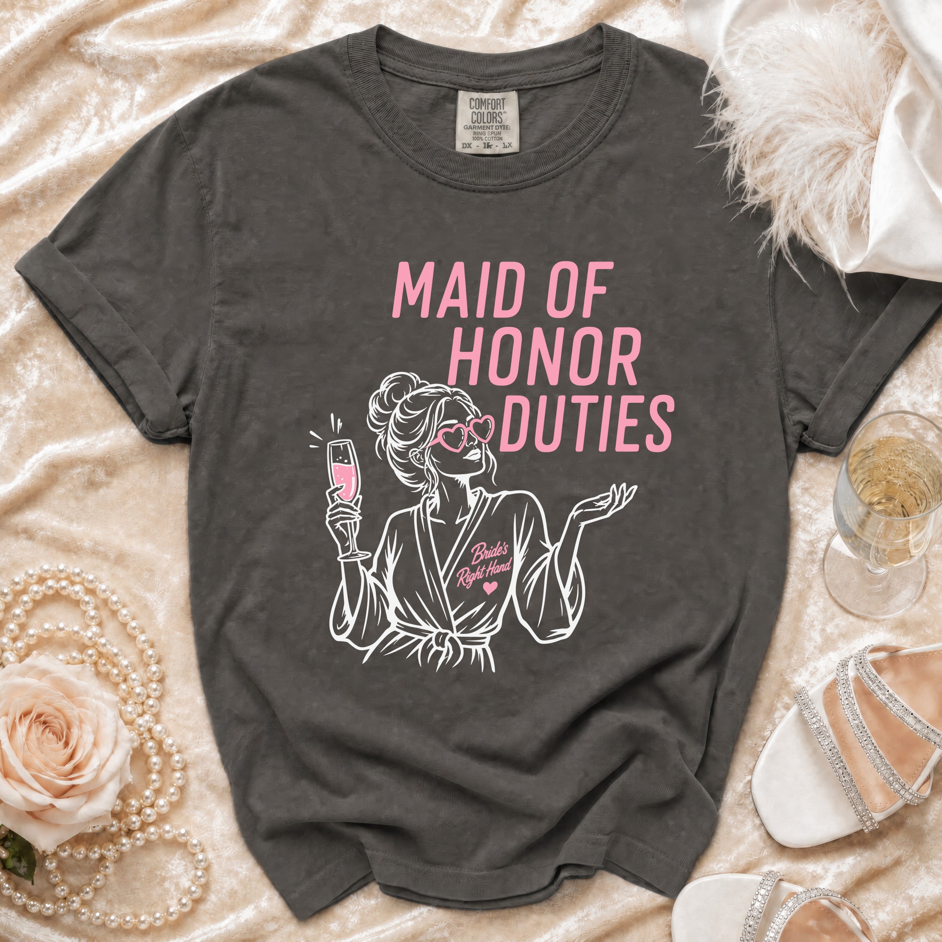 Dark grey t-shirt with pink "Maid of Honor Duties" text and Bride's Right Hand graphic.