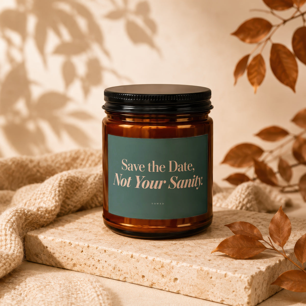 Amber candle with black lid, "Save the Date, Not Your Sanity" label.