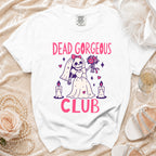 White t-shirt with "DEAD GORGEOUS CLUB" text and skeleton bride graphic.