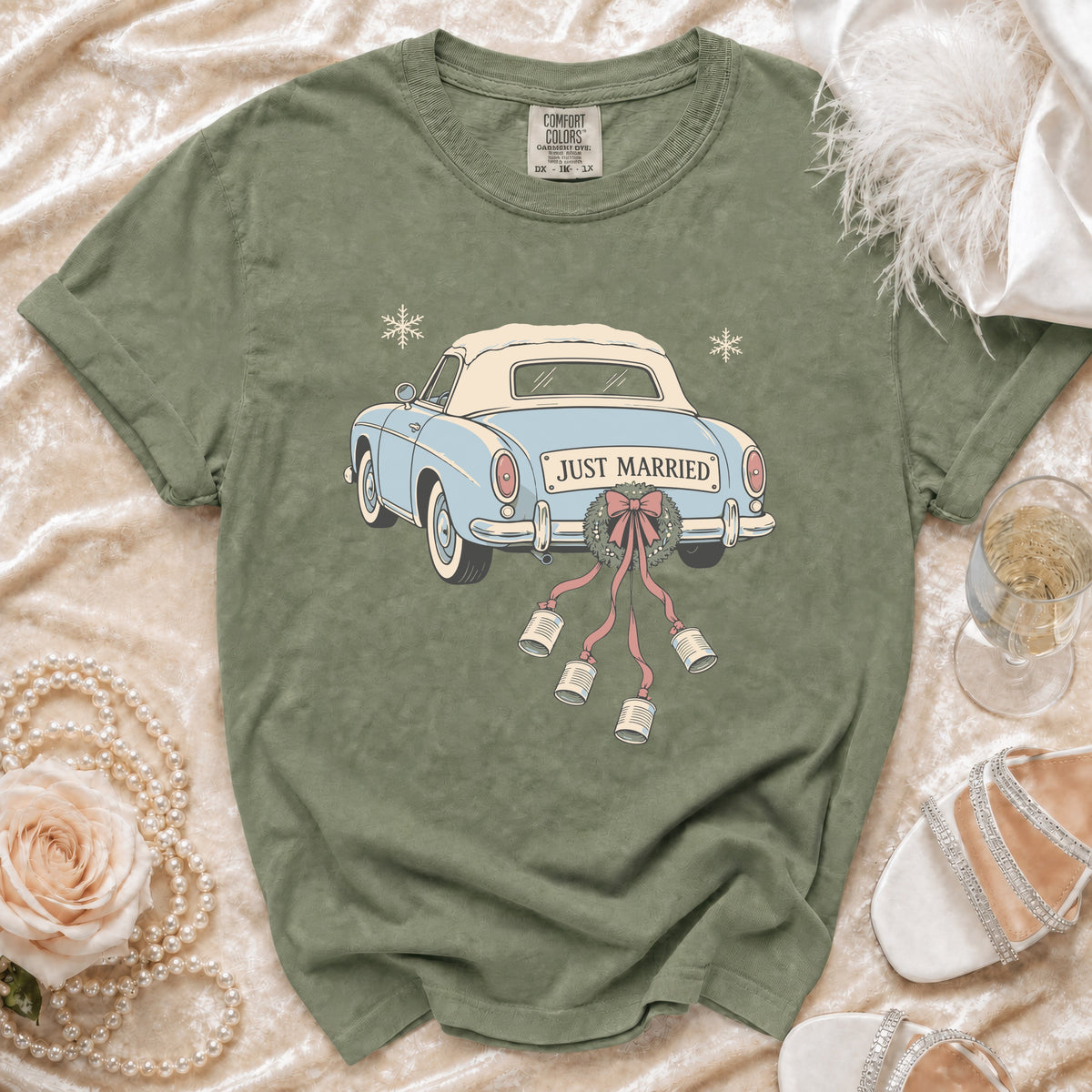 Green t-shirt with a blue convertible car graphic that says "Just Married".