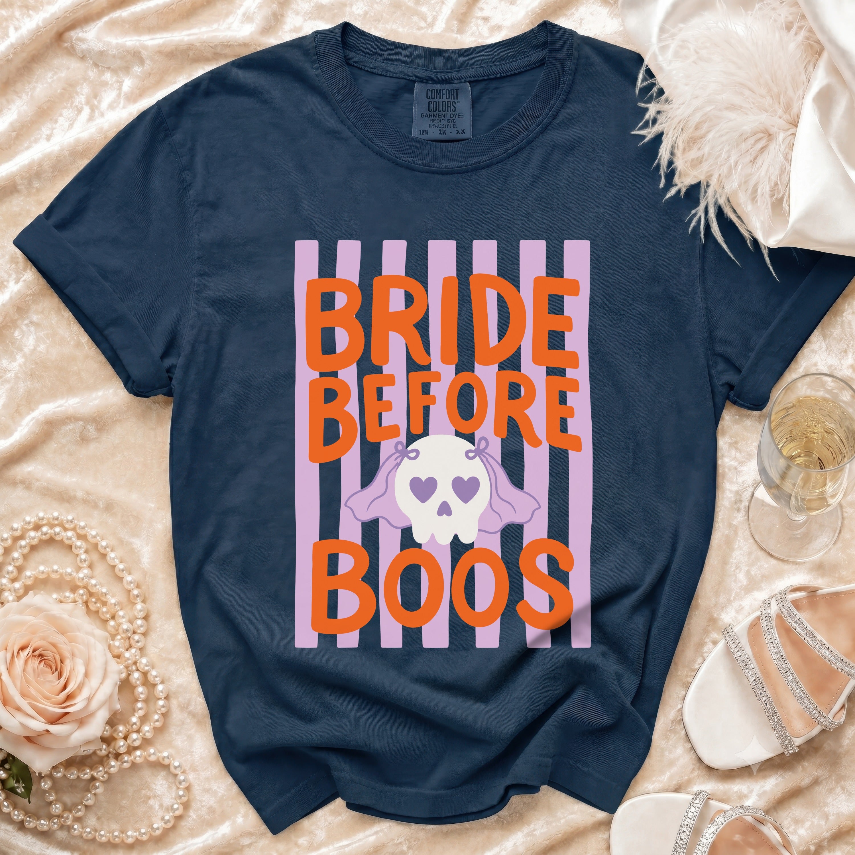 Navy t-shirt with "BRIDE BEFORE BOOS" text and a ghost graphic.