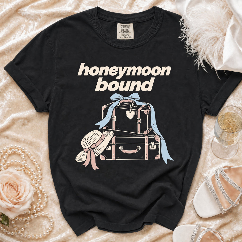 Black t-shirt with "honeymoon bound" text and luggage graphic.