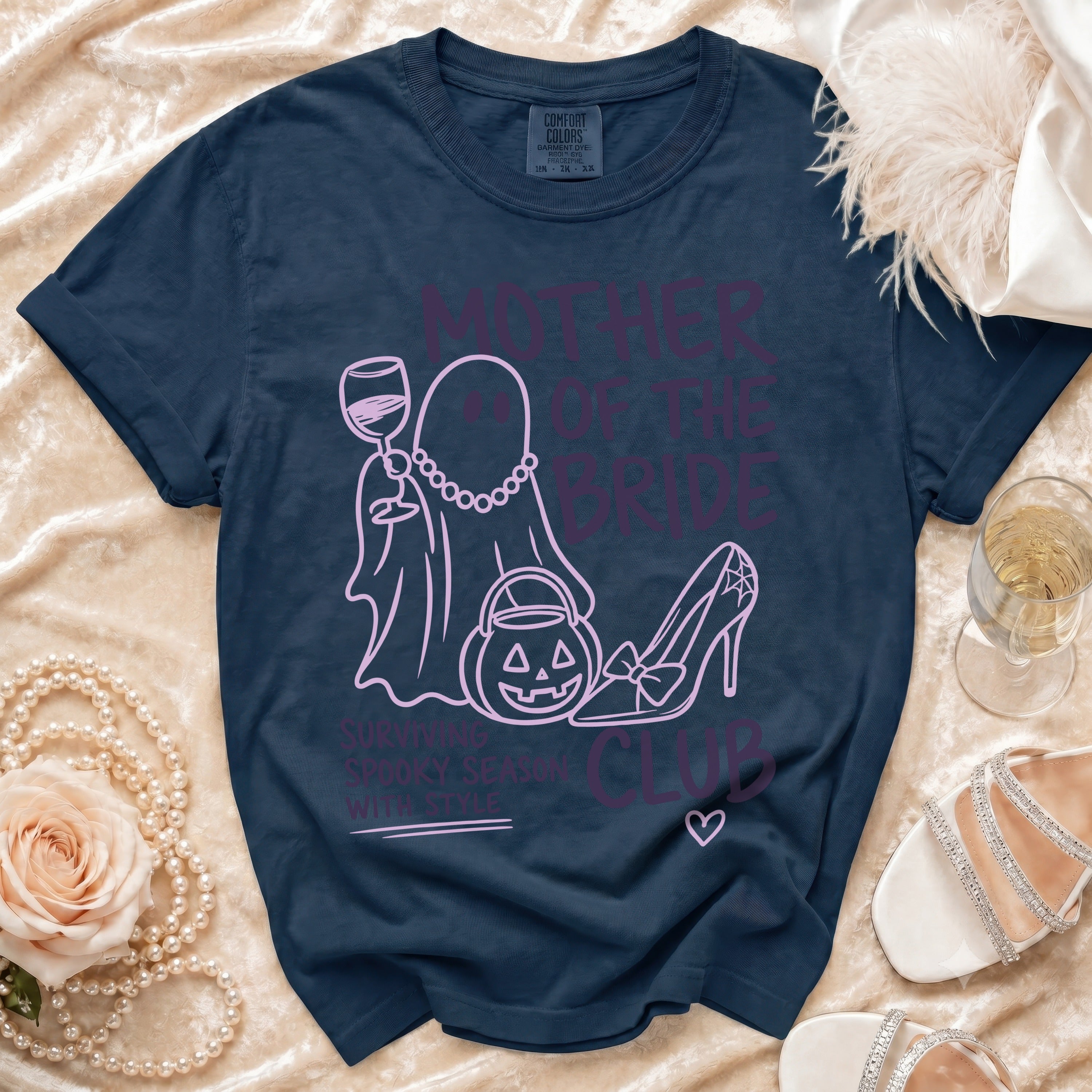 Navy t-shirt with "Mother of the Bride" ghost graphic and spooky season text.