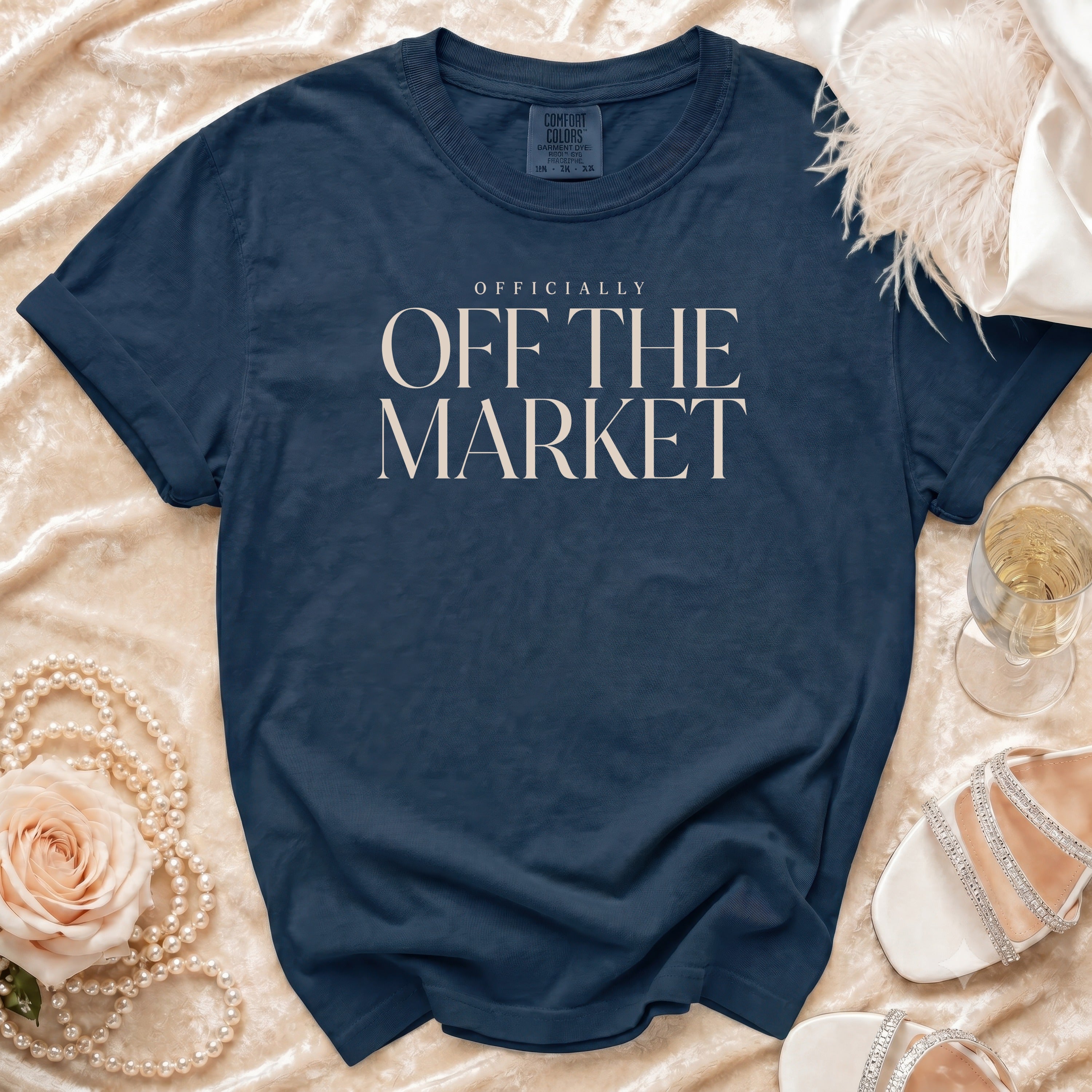 Navy blue t-shirt with "OFFICIALLY OFF THE MARKET" text.