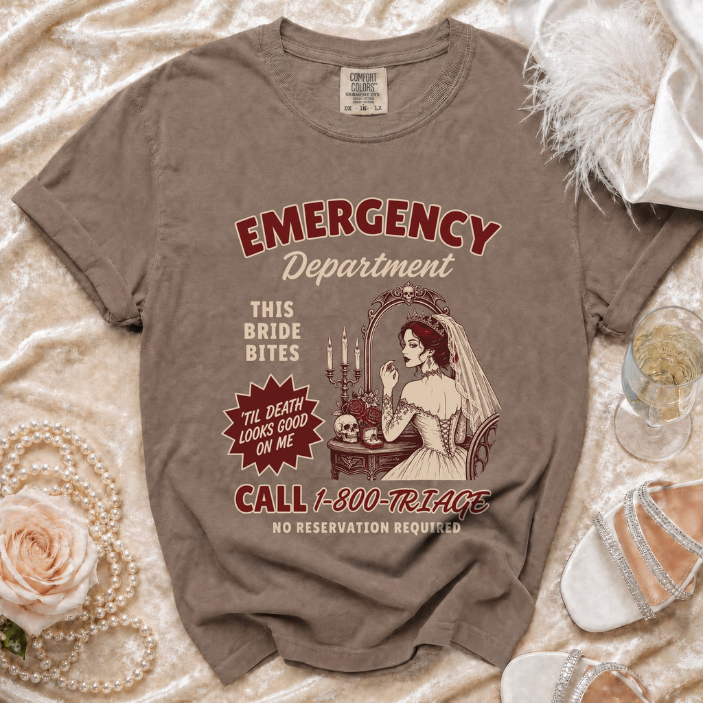 Brown t-shirt with "EMERGENCY DEPARTMENT THIS BRIDE BITES" graphic and phone number.
