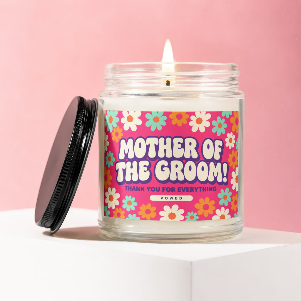 Candle with "Mother of the Groom! Thank You For Everything Vowed" text on a floral label.
