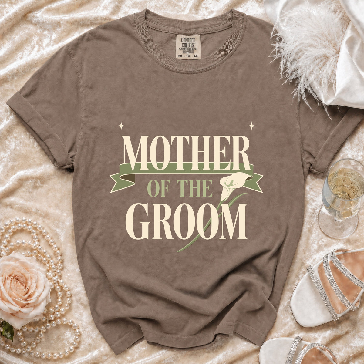 Brown t-shirt with "Mother of the Groom" text and floral graphic.