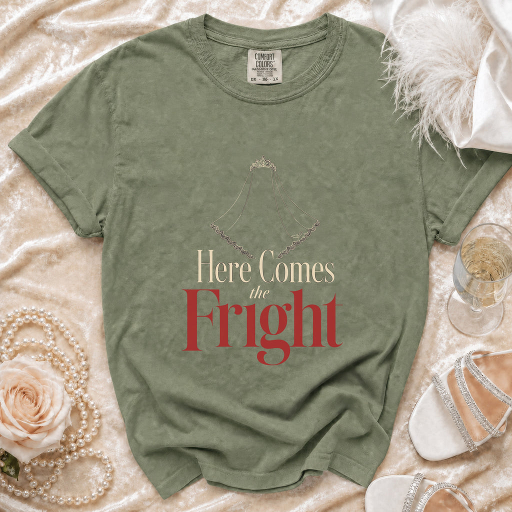 Green t-shirt with "Here Comes the Fright" text and a bride's veil graphic.