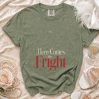 Green t-shirt with "Here Comes the Fright" text and a bride's veil graphic.