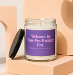 Glass candle with purple label reading "Welcome to Your Pre-Wedding Era. Showers, Fittings and Happy Tears."