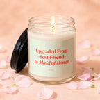 Candle with "Upgraded From Best Friend to Maid of Honor" text, surrounded by pink petals.