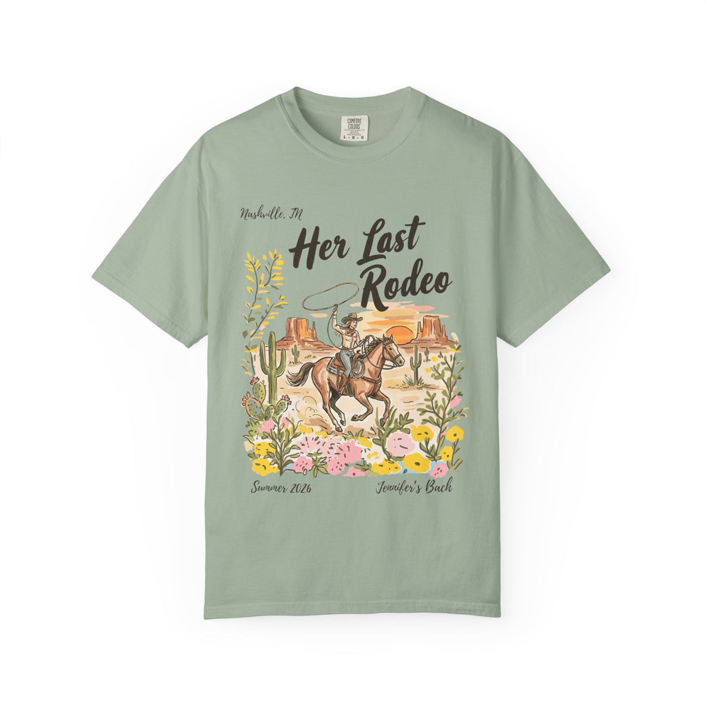 "Her Last Rodeo" t-shirt with cowboy on horseback, desert, and flowers.