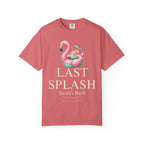 Salmon t-shirt with "Last Splash" and flamingo float graphic.