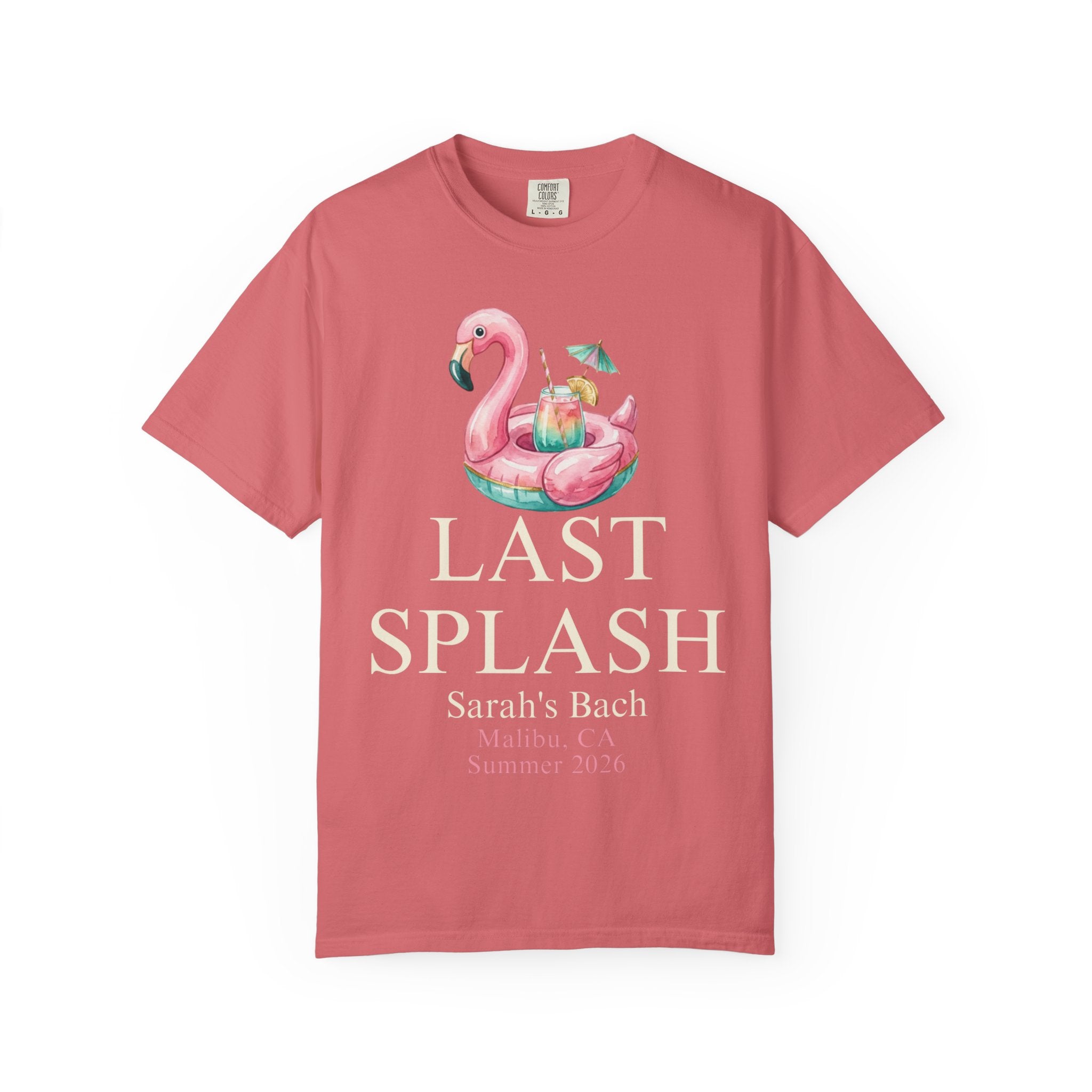 Salmon t-shirt with "Last Splash" and flamingo float graphic.