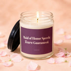 Glass candle with lit wick, reads "Maid of Honor Speech: Tears Guaranteed."