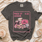 Maid of Honor t-shirt with pink border, makeup, and text.