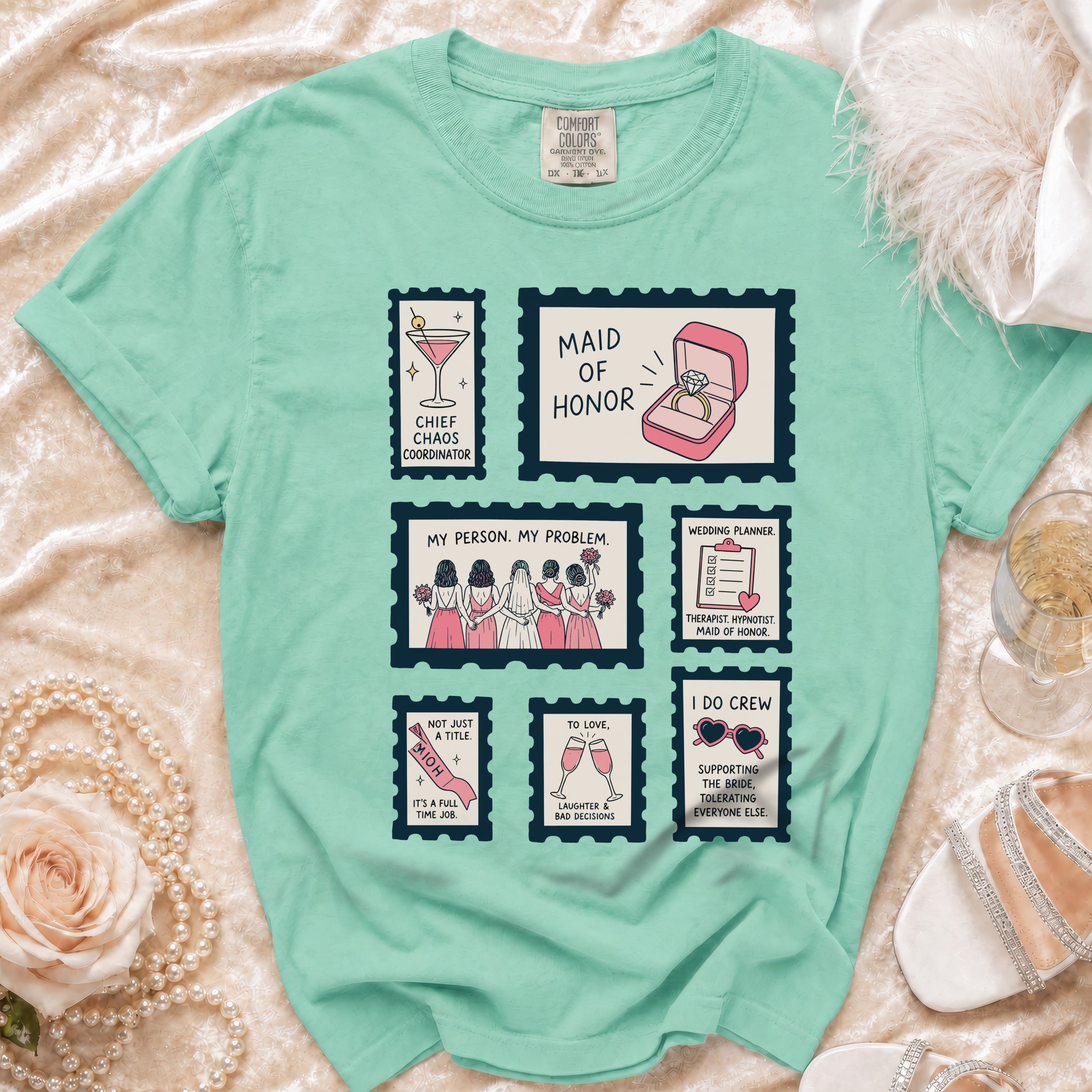Mint t-shirt with maid of honor and bridal party themed stamp graphics.