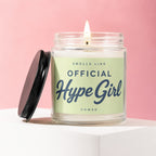Jar candle with lit wick reads "Smells Like Official Hype Girl Vowed".