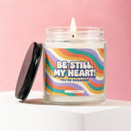 Jar candle with "BE STILL, MY HEART! YOU'RE ENGAGED! VOWED" text on retro wavy label.