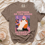 Brown t-shirt with "Mother of the Bride Scared of Nothing" graphic.