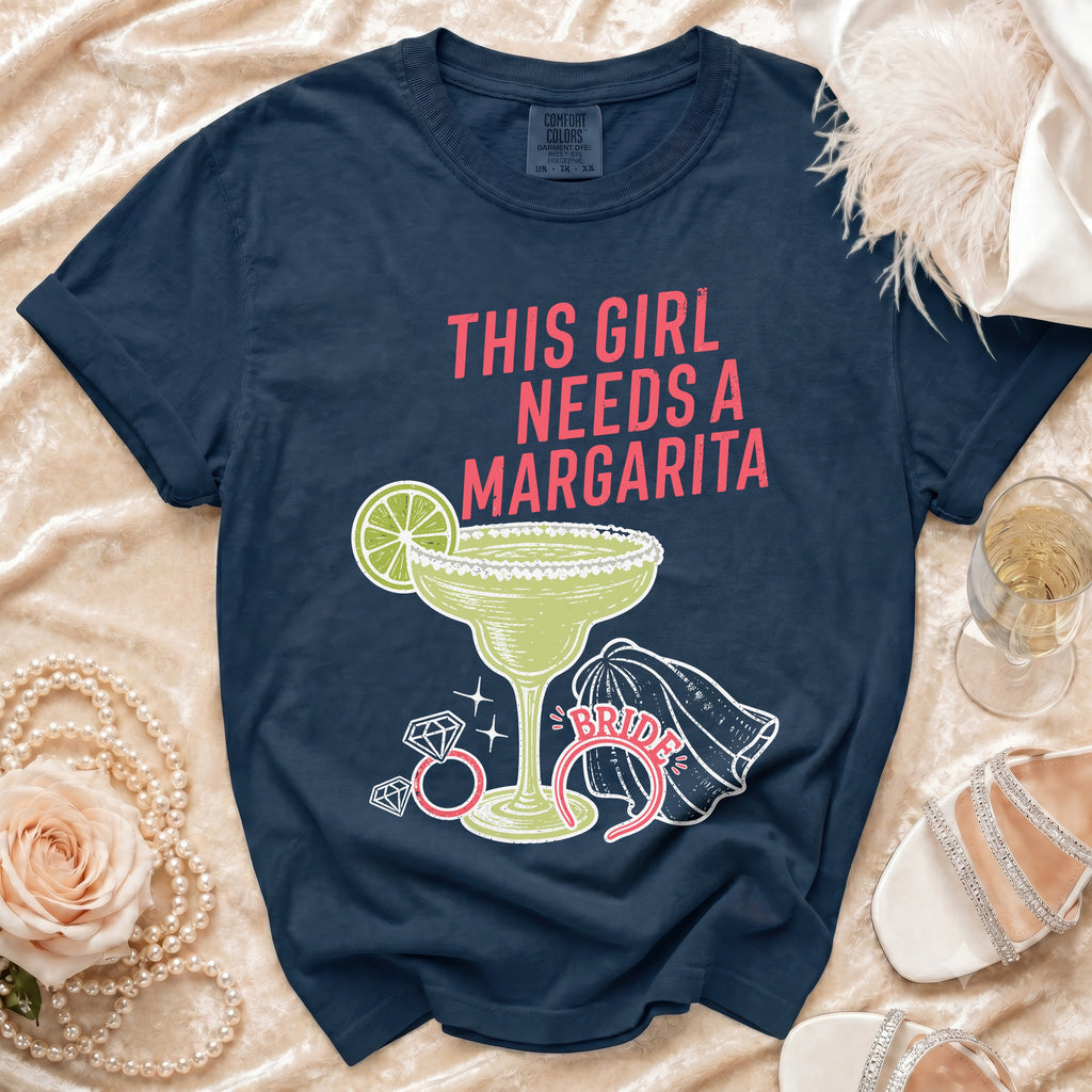 Navy t-shirt with "This girl needs a margarita" text and a margarita graphic.