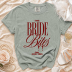 Sage t-shirt with red text "THIS BRIDE Bites ONLY GOOD VIBES".