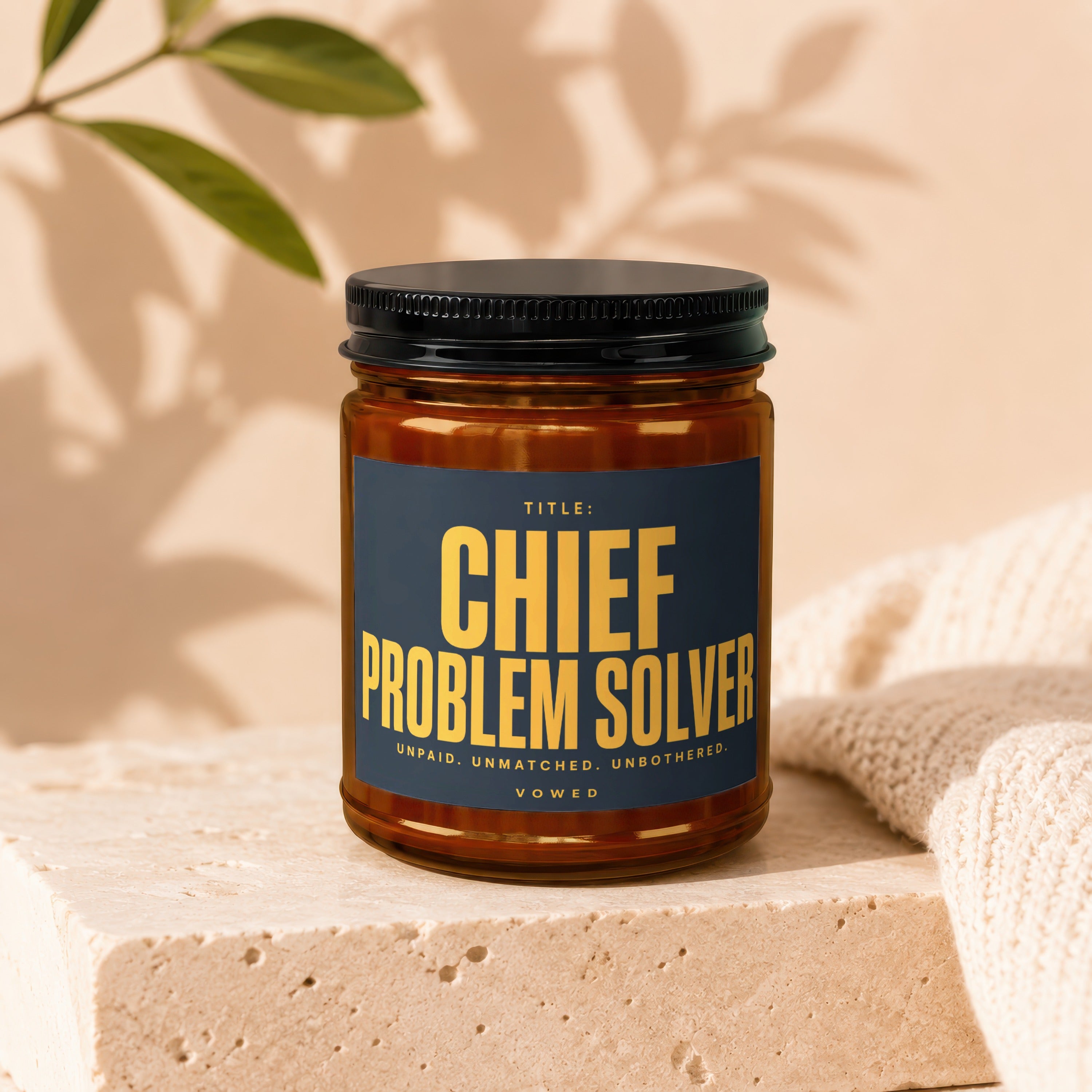 Brown glass jar with dark blue label reading "CHIEF PROBLEM SOLVER".