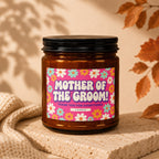 Candle with "MOTHER OF THE GROOM! THANK YOU FOR EVERYTHING" text on a retro floral label.