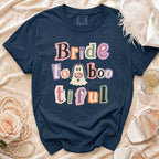 Navy t-shirt with "Bride to Boo-tiful" text and ghost graphic.