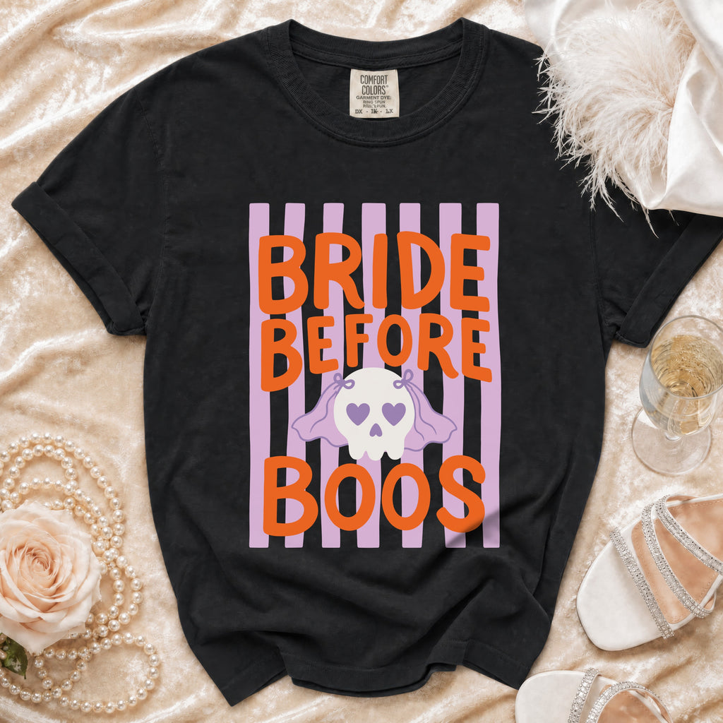 Black t-shirt with "BRIDE BEFORE BOOS" text and a ghost skull graphic.