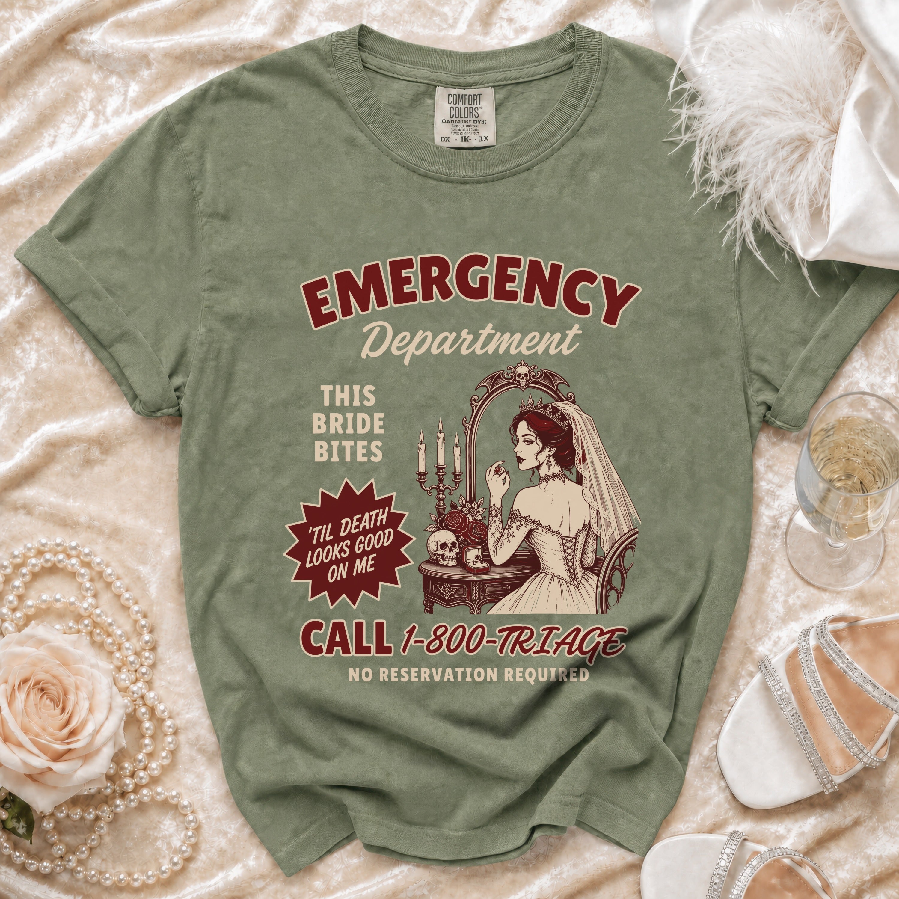 Green t-shirt with "Emergency Department This Bride Bites 'Til Death Looks Good On Me" text and art.