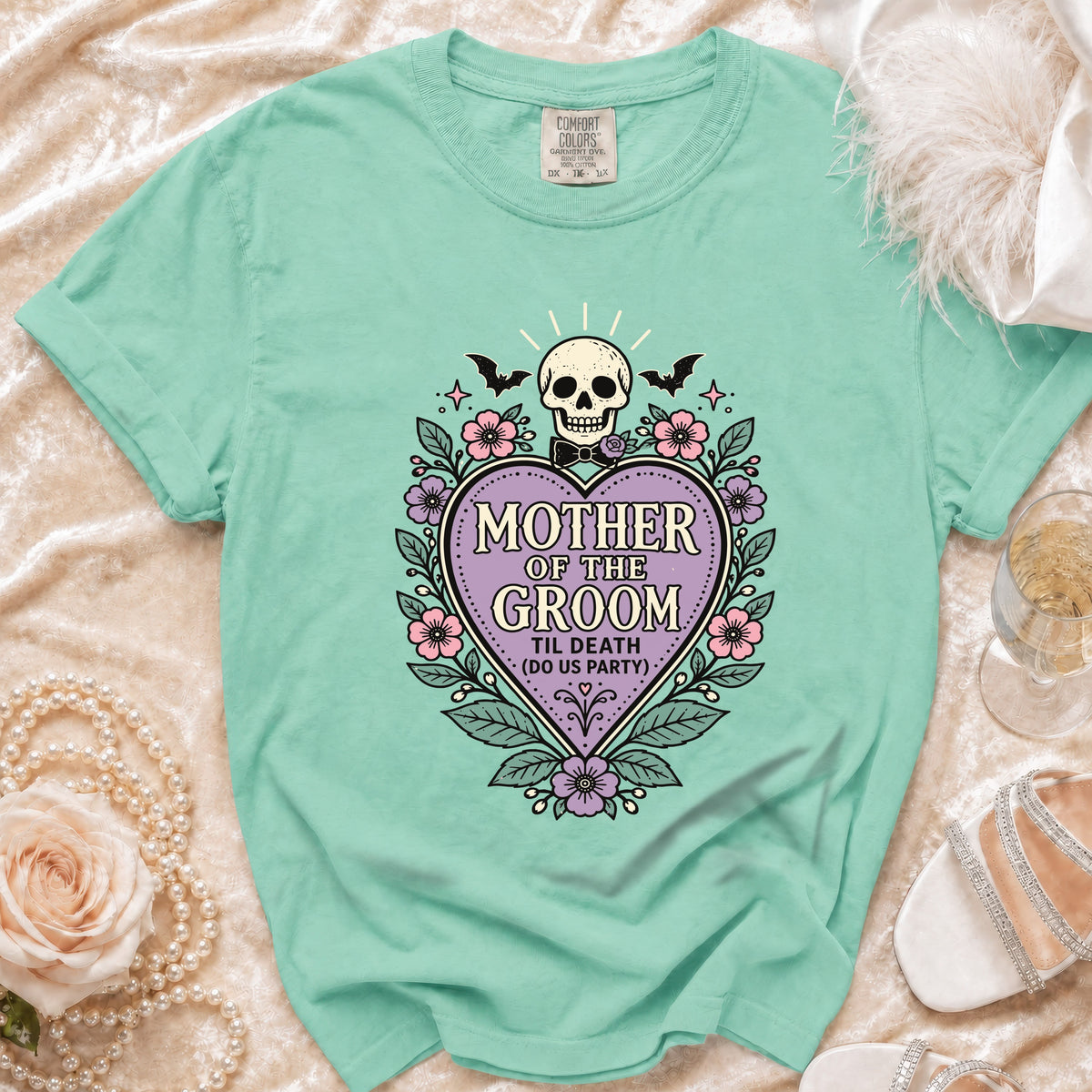 Teal t-shirt with "Mother of the Groom Til Death (Do Us Party)" graphic.