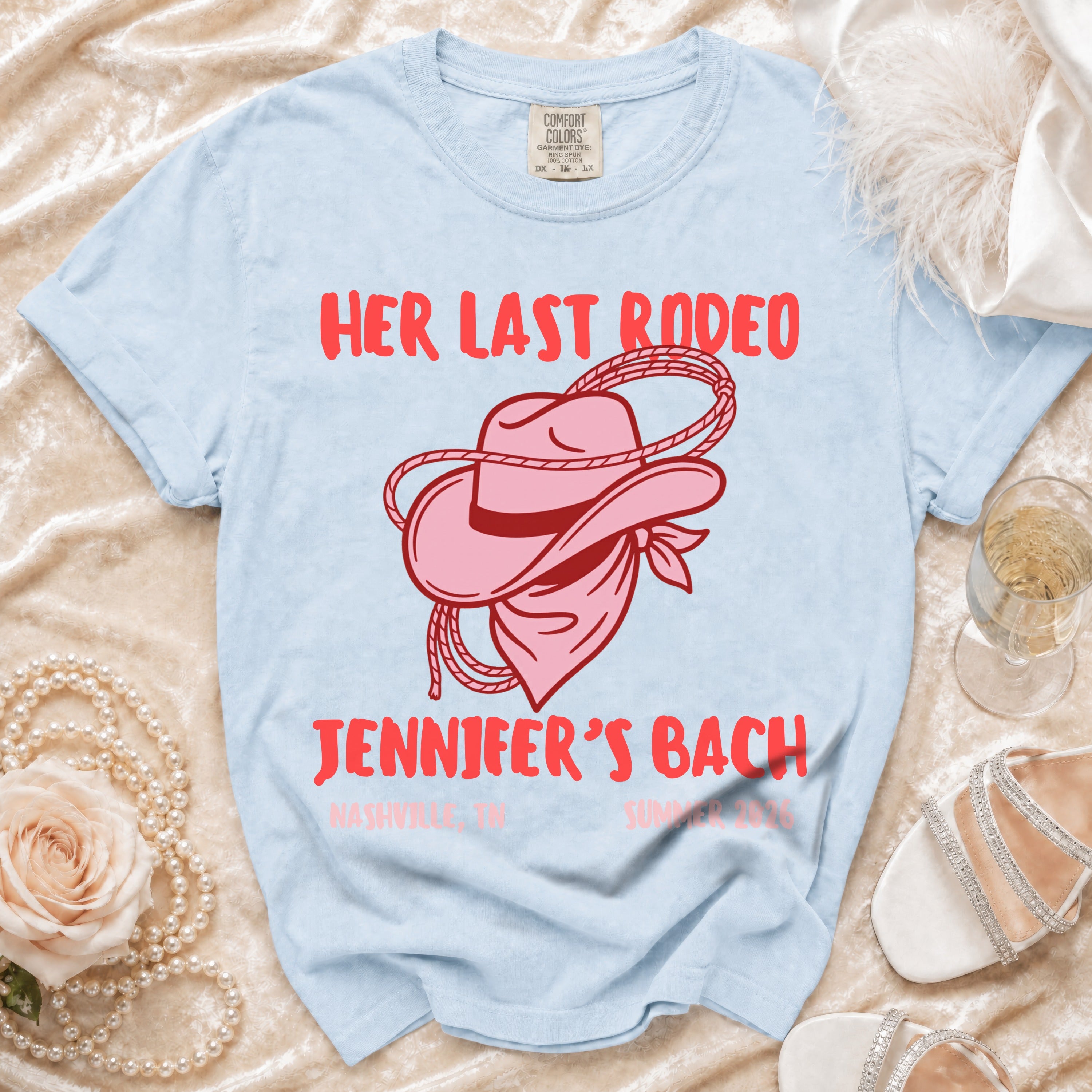 Blue t-shirt with "Her Last Rodeo" and "Jennifer's Bach" in pink graphic.