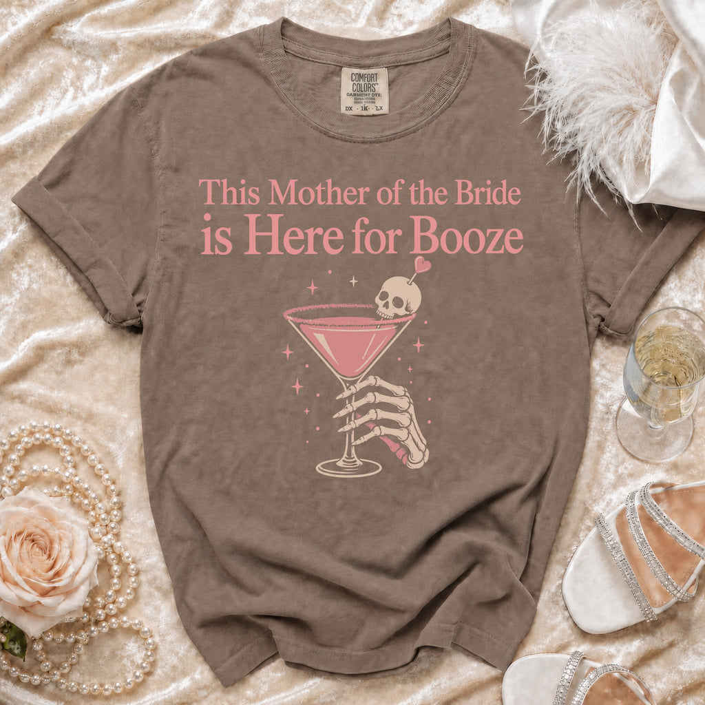 Brown t-shirt with "This Mother of the Bride is Here for Booze" graphic.