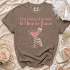 Brown t-shirt with "This Mother of the Bride is Here for Booze" graphic.