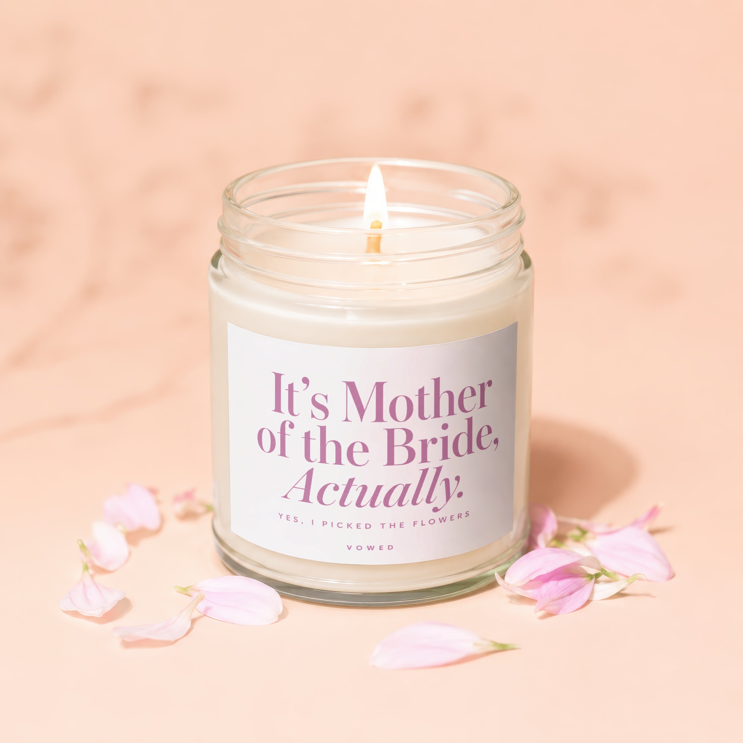 Candle with text "It's Mother of the Bride, Actually." and "VOWED".