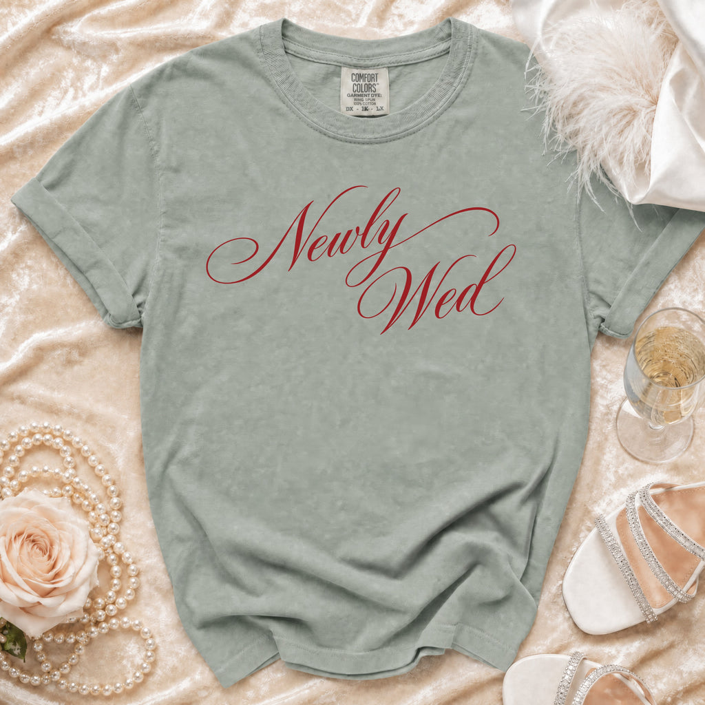 Light green t-shirt with "Newly Wed" in red script and Comfort Colors tag.