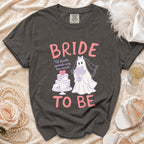 Bride to Be t-shirt with ghost bride, wedding cake, and skull graphic.