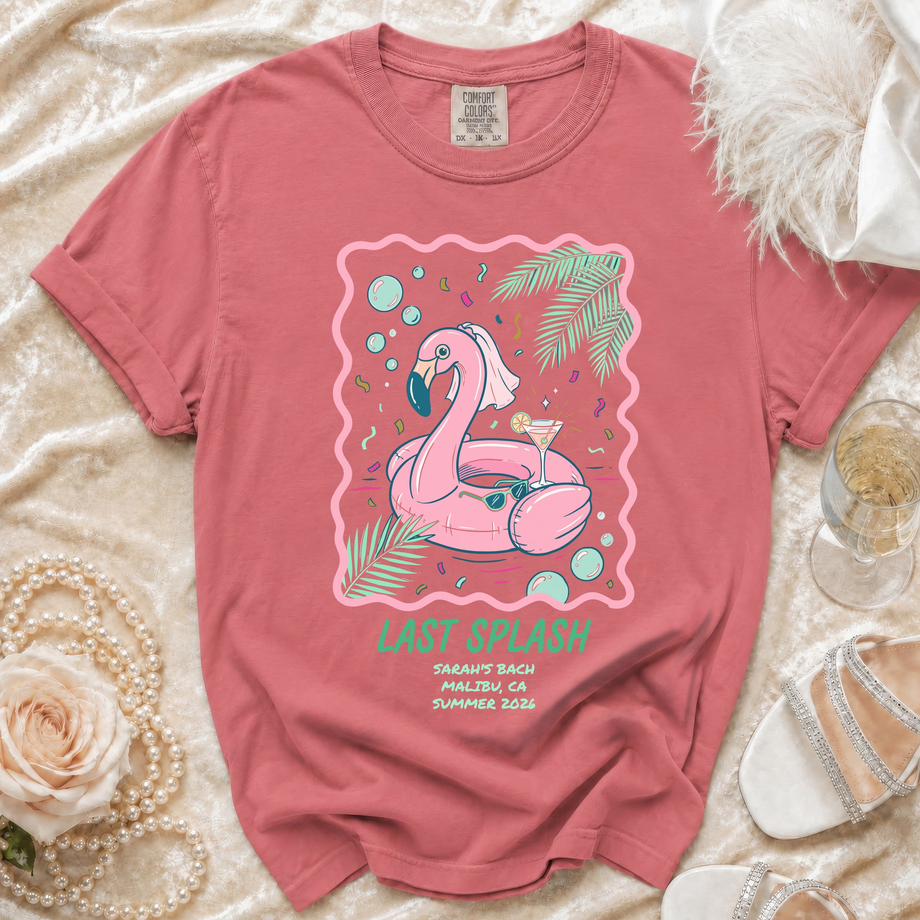 Pink flamingo inflatable with "LAST SPLASH" text, for a bachelorette party.