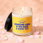 Candle with yellow label that reads "Vowed light me when someone asks if we have a date yet."