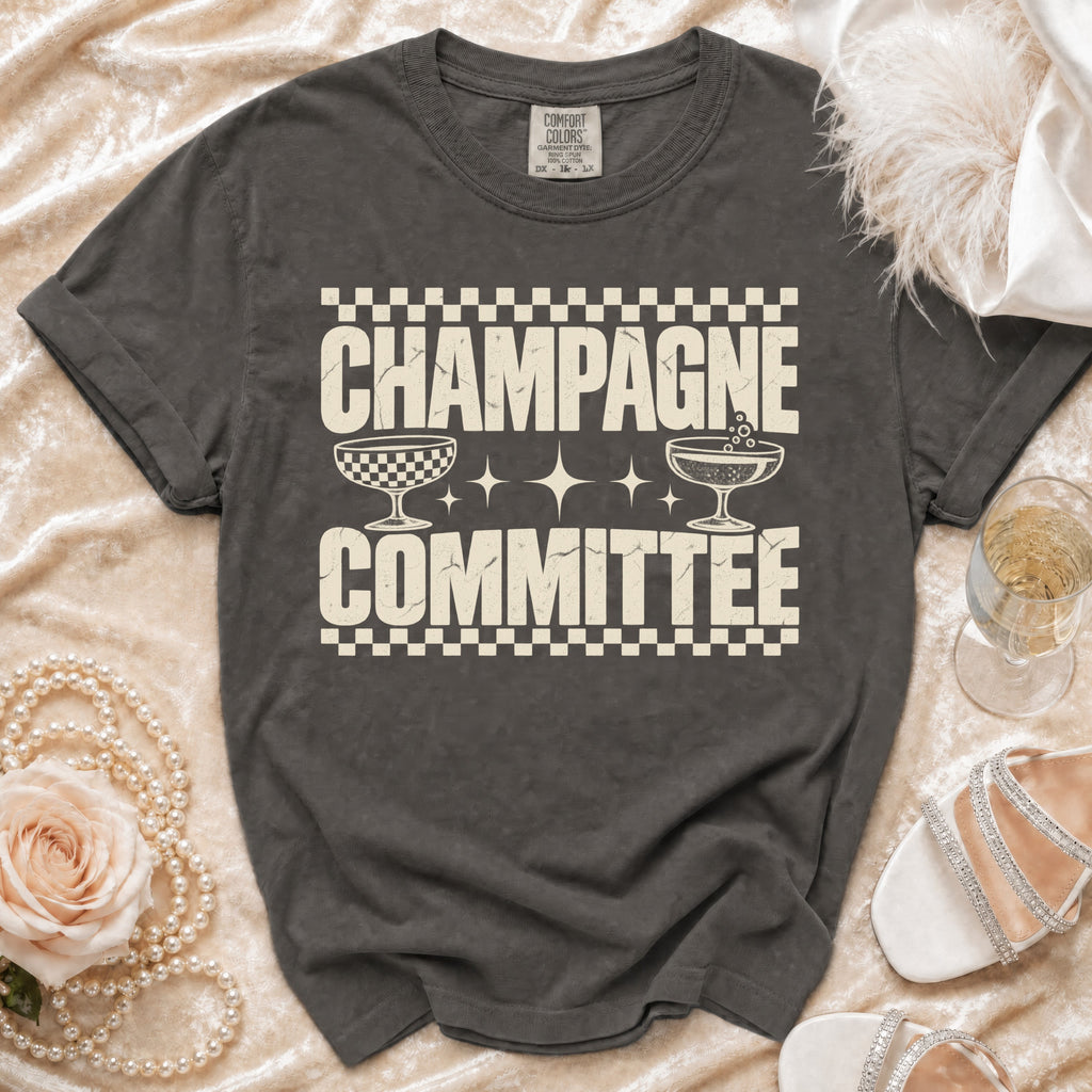 T-shirt with "Champagne Committee" text and champagne glasses graphics.
