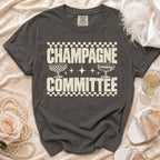 T-shirt with "Champagne Committee" text and champagne glasses graphics.