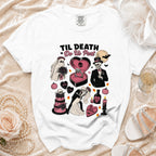 White t-shirt with "Til Death Do Us Part" graphic of skeleton couple and wedding elements.