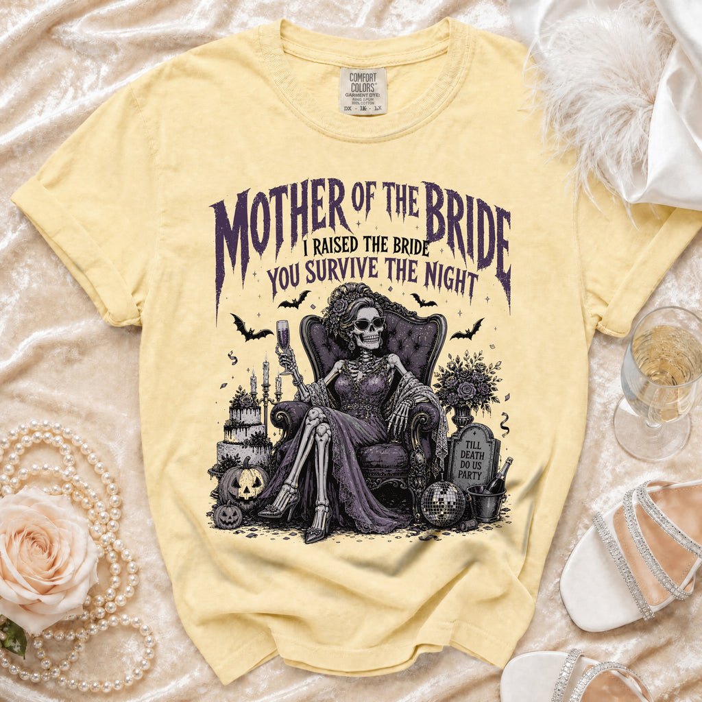 Yellow t-shirt with "Mother of the Bride, I Raised the Bride, You Survive the Night" text and skeleton bride graphic.