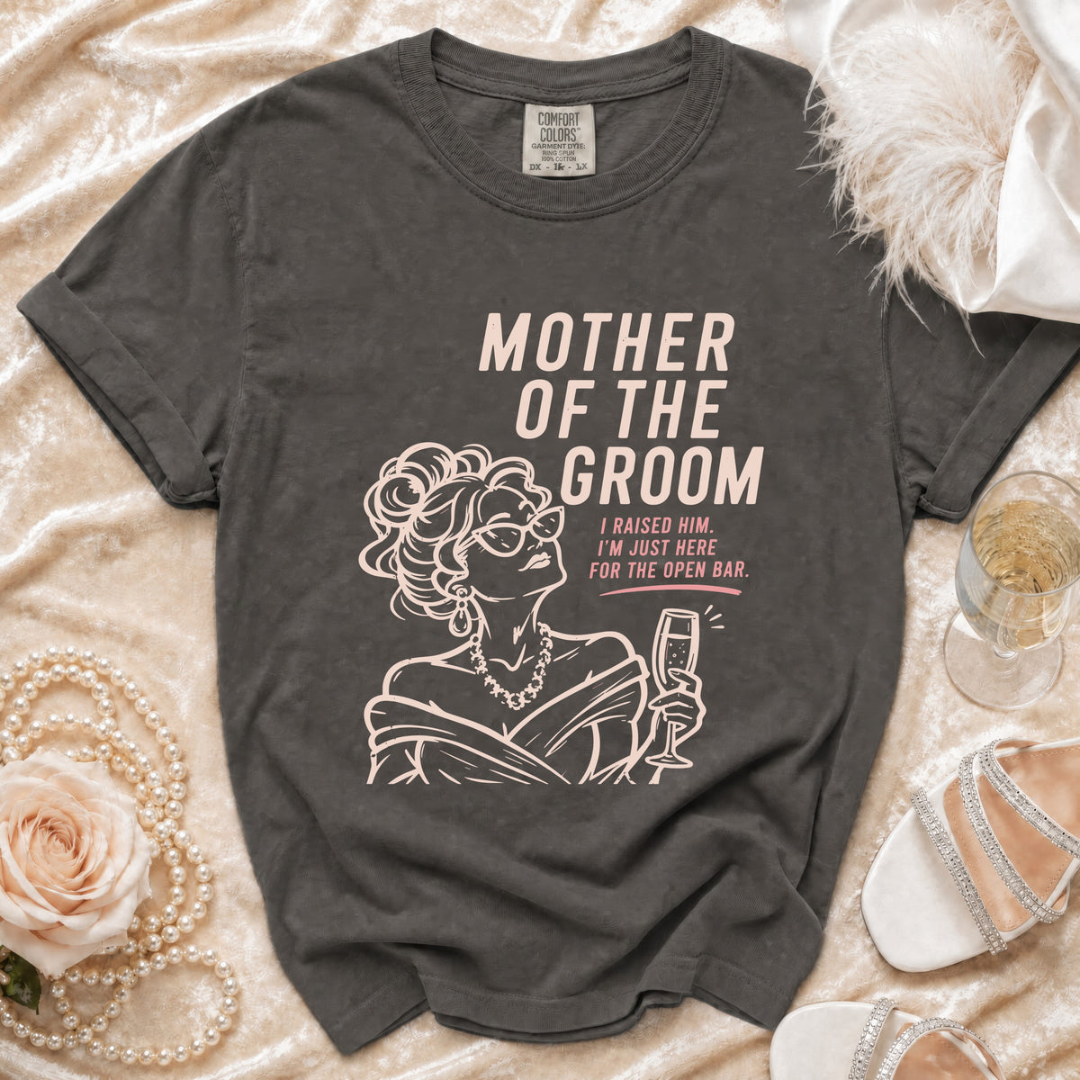Dark grey t-shirt with "Mother of the Groom I Raised Him. I'm Just Here For The Open Bar." text.