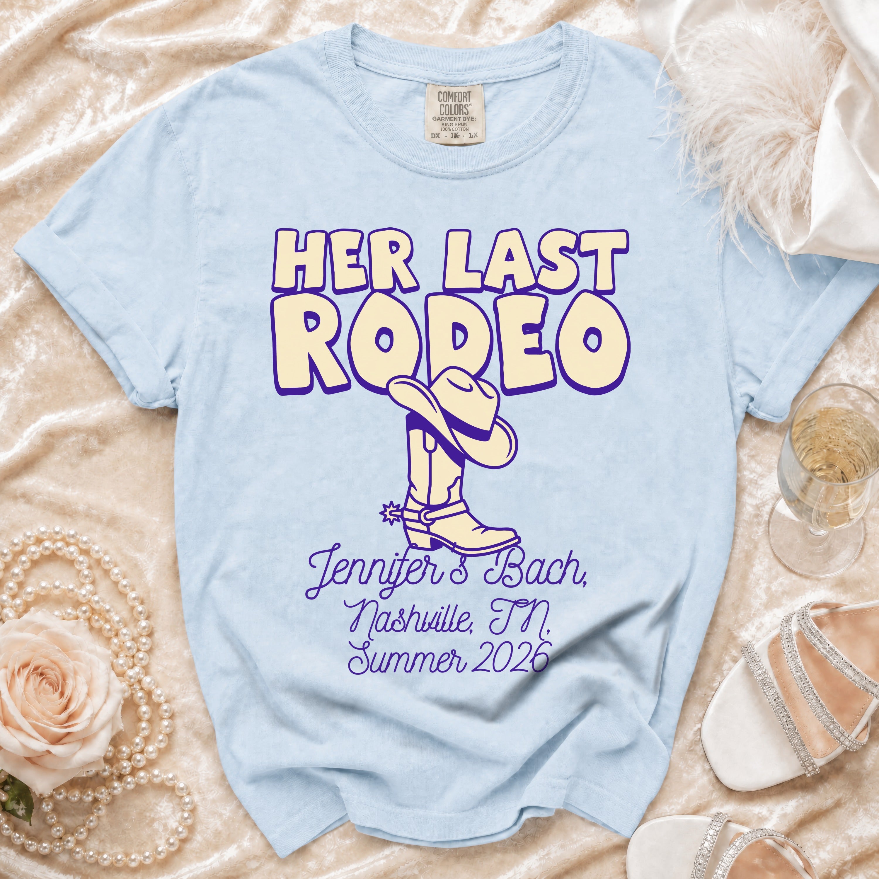 Light blue t-shirt with "HER LAST RODEO" and Nashville bachelorette details.