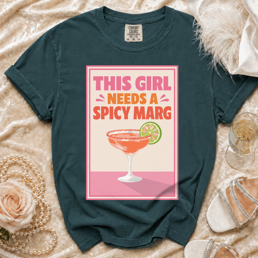 T-shirt with "This girl needs a spicy marg" graphic featuring a margarita.