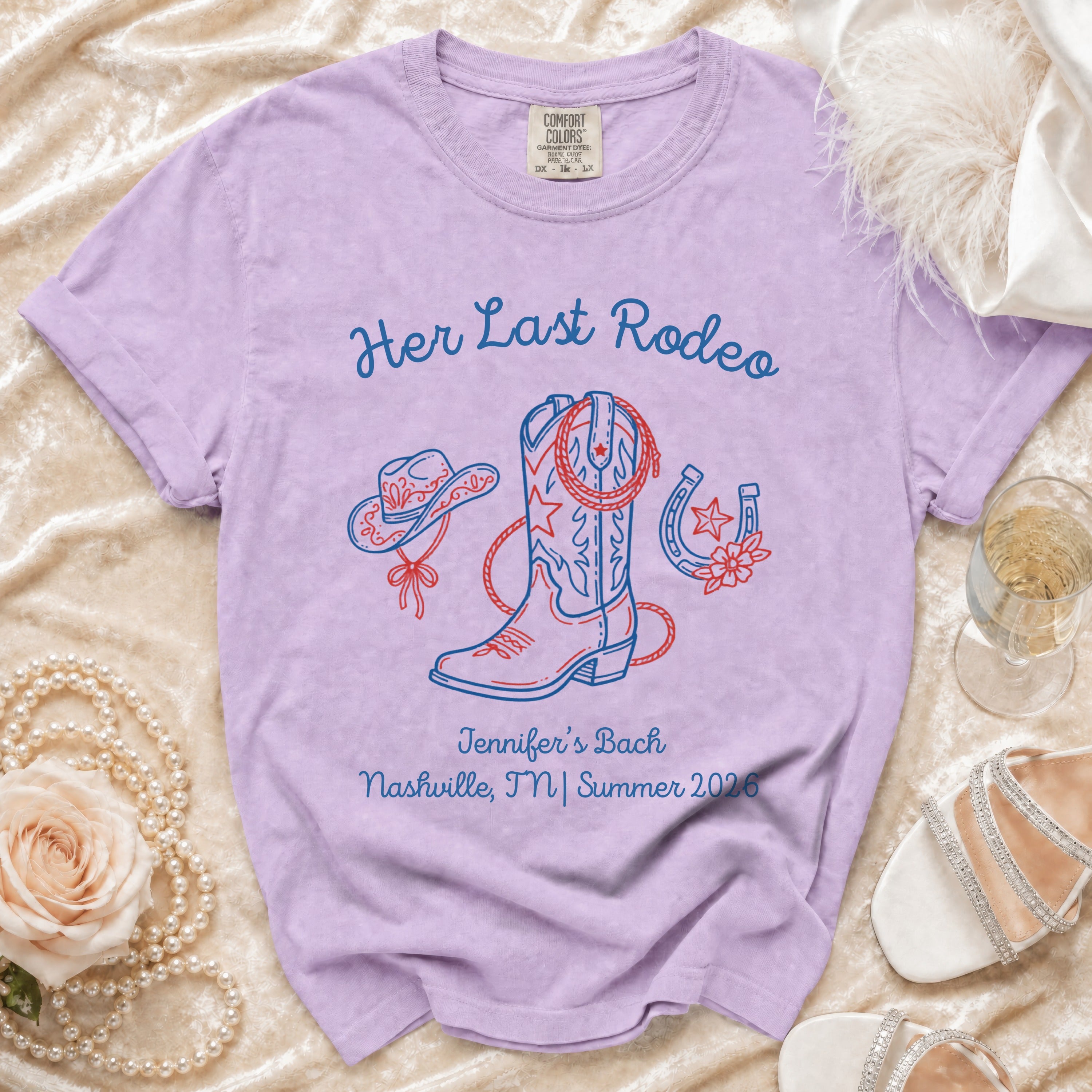 Purple t-shirt with "Her Last Rodeo" and western-themed graphics.