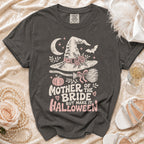 Grey t-shirt with "Mother of the Bride But Make It Halloween" text and witch hat graphic.