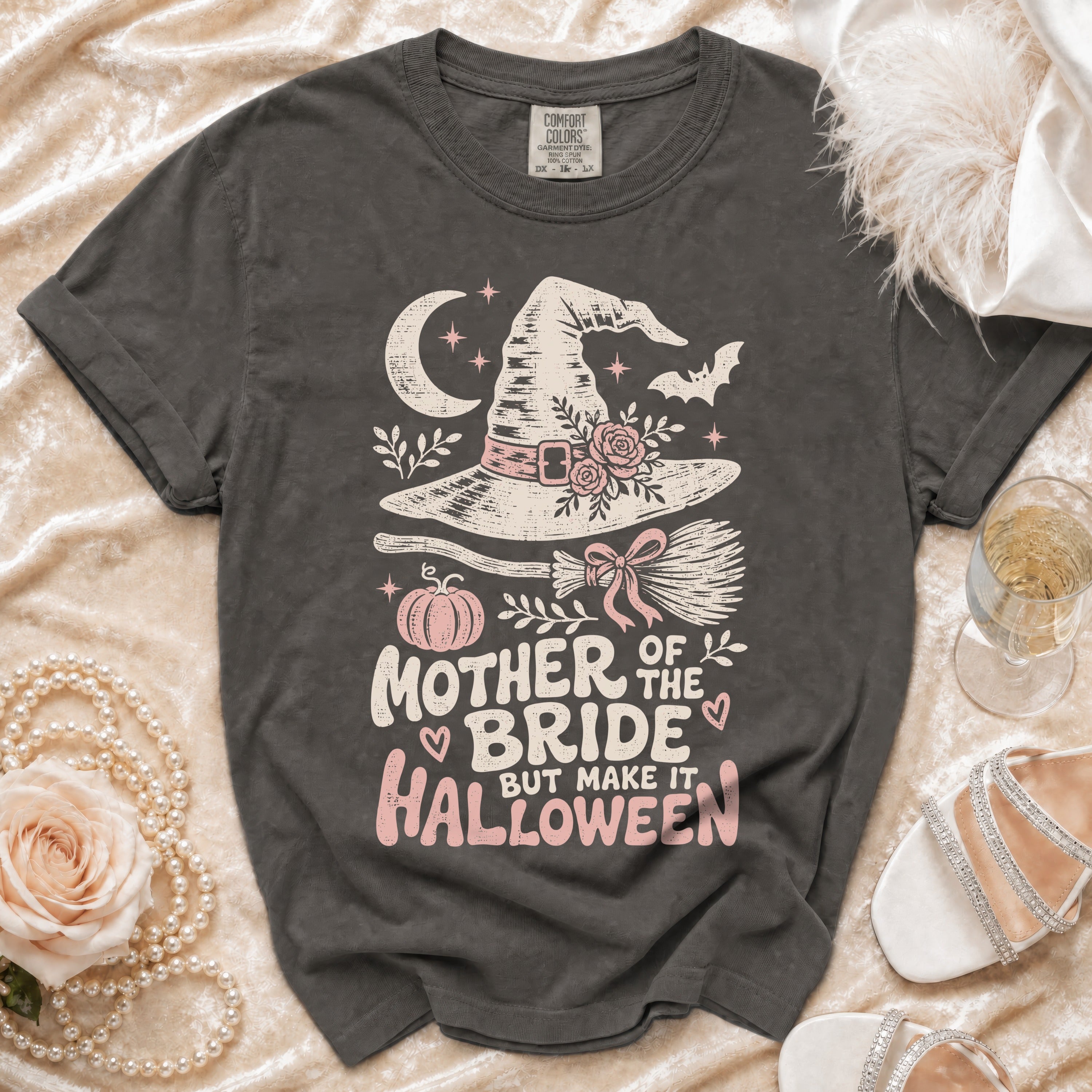 Grey t-shirt with "Mother of the Bride But Make It Halloween" text and witch hat graphic.